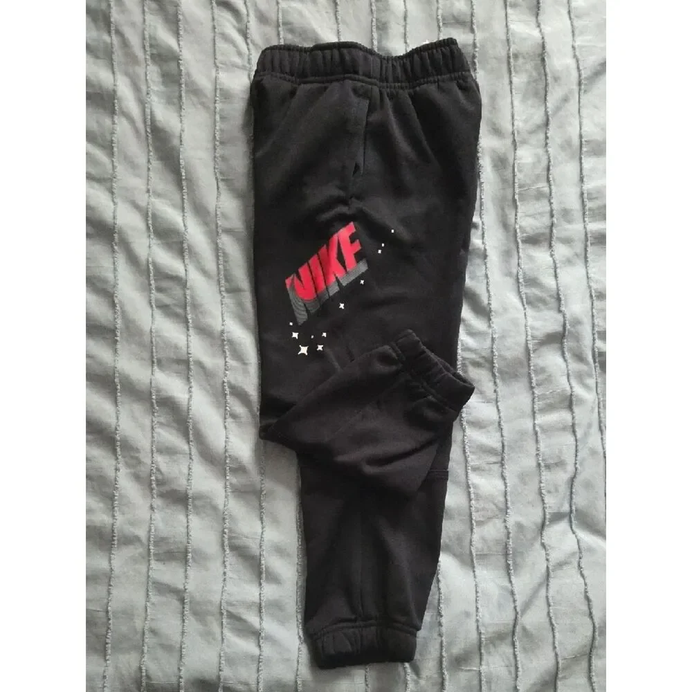 Nike Kids Black Sweatpants with Pink Logo